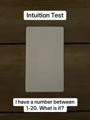 The image shows a vertical composition with a light brown wooden background. Centered, a rectangle is displayed. Above the rectangle, there is a text box with the words 'Intuition Test'. Below the rectangle, there is a text box that says 'I have a number between 1-20. What is it?'