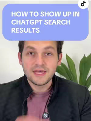 A man with brown hair and a black jacket is centered in the shot. A blue rounded rectangle banner sits above his head with the white text: “HOW TO SHOW UP IN CHATGPT SEARCH RESULTS”. The background is a light-colored wall, and there is a green plant to his right.