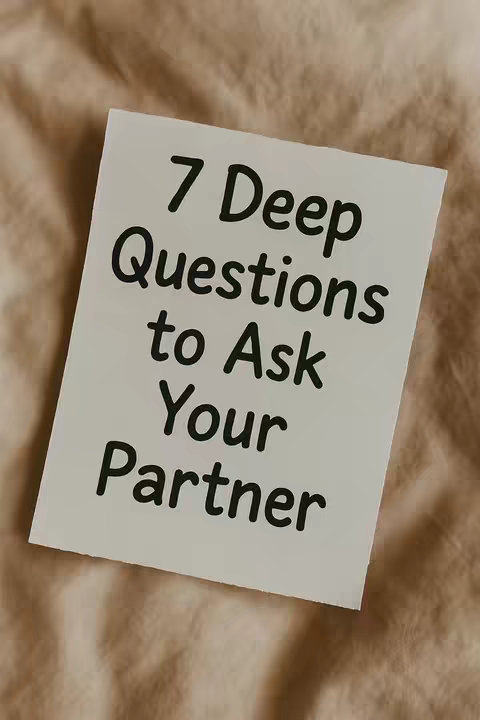 A white rectangular card is centered against a soft, textured beige background. Bold, black text is arranged on the card in three sections: '7 Deep,' 'Questions,' and 'to Ask Your Partner,' with each line centered to create a balanced composition. The background has subtle texture.