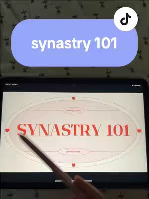 The cover image shows a close-up shot of a tablet displaying a presentation. The top half has a purple oval that says 'synastry 101' in white font. The bottom half displays what appears to be a presentation screen with a red text 'SYNASTRY 101' with a pink-colored ring diagram around it. A hand with a pen appears to be interacting with the tablet.