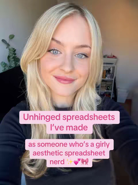 A young woman with long blonde hair and blue eyes is centered in the frame. She is smiling slightly and looking at the camera. Text overlays appear in bubble-like shapes with pink backgrounds. To her right, a glimpse of a shelf with objects is visible. The background has a light color, suggesting a room with natural lighting.