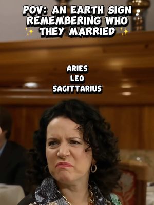 The cover image features a woman with dark curly hair making a face of bewilderment, potentially confusion, in a restaurant setting. The top of the image displays text reading "POV: AN EARTH SIGN REMEMBERING WHO THEY MARRIED" in a white box with a black outline, and the text "ARIES LEO SAGITTARIUS" in another box below. The woman's attire includes a patterned jacket and a necklace.
