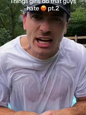 A man in a white, wet t-shirt looks directly at the camera with an intense expression. The text overlay indicates the video is about things girls do that guys hate. The background is blurred, suggesting an outdoor setting.