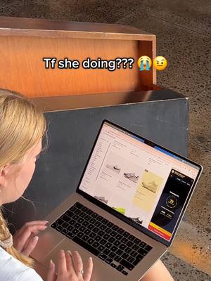 A woman is seen from behind, sitting with a laptop on her lap. The laptop screen displays a shopping website. Above the frame, text reads, Tf she doing??? with crying and side-eye emojis.