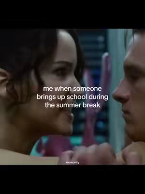The cover image features a scene from a movie. Two people are close to each other, almost touching noses. At the bottom center is visible text that says, "me when someone brings up school during the summer break."