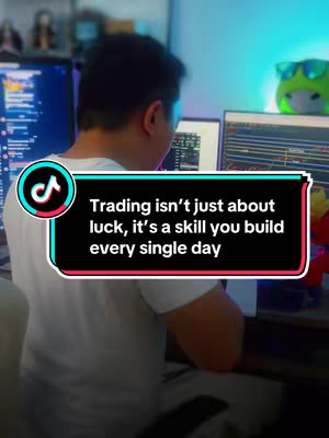 The cover image features a man viewed from the back, seated in front of two computer monitors displaying trading charts. Text overlays the image within a stylized shape.