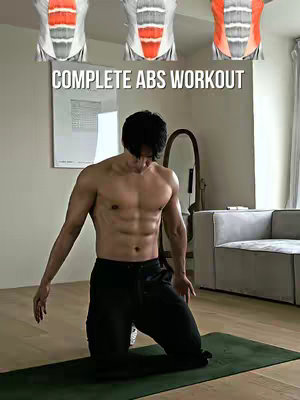 A man with a muscular physique is kneeling on a green yoga mat, with a white wall behind him. There is text layered on top of the image, including anatomical diagrams of abs muscles. The background provides a tidy, minimalist setting.