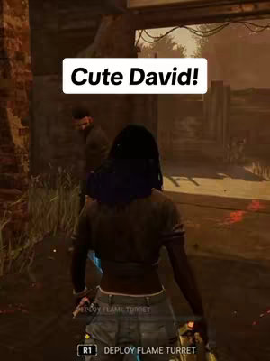 The image is a screenshot from a video game, showing a character from behind with a dark hairstyle, facing an indistinct scene. A white box with the text 'Cute David!' is overlaid near the top. In the background, other game characters and the game environment are visible. The color palette appears to be muted, with a focus on browns, greens, and darker muted tones.
