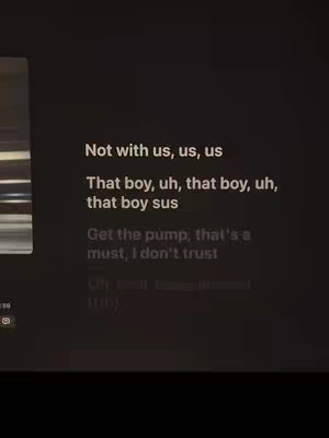 The cover image shows lyrics from a song against a dark background. The text is in white and positioned centrally, featuring lines from what appears to be a rap song.