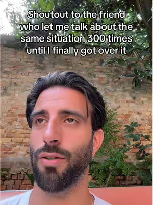 A man with dark hair and a beard is looking slightly off-camera, with overlay text on the top.