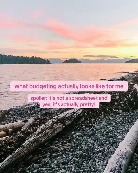 A serene landscape featuring a body of water at sunset. The sky is filled with pink and orange hues, and the water reflects the colors. A pink rectangular text box overlaps the scene, containing the text overlay.