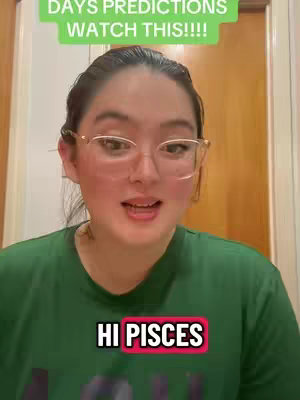 A selfie-style video featuring a woman with fair skin, glasses, and a green shirt. Text overlays declare, "DAYS PREDICTIONS WATCH THIS!!!!" in green at the top and "HI PISCES" in a red box at the bottom. The background suggests a neutral interior setting.