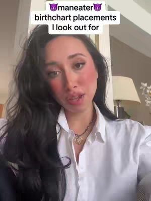 A woman with long dark hair and fair skin is the focus, with a white collared shirt. The background shows a room with indirect light and soft tones, creating a casual setting. Text overlays appear at the top.