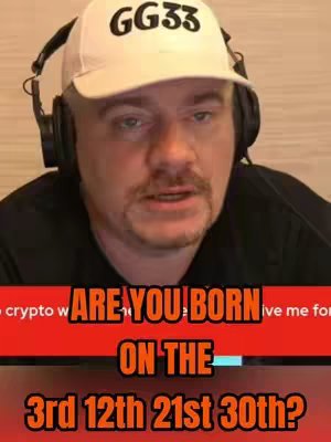 The cover image is a selfie-style shot of a man wearing a white cap with 'GG33' printed on it and headphones. He is in front of a light-colored wall. Overlayed on the image are text elements on a red background asking if the viewer was born on certain dates, related to numerology and astrology, as suggested by the caption.