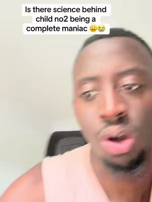 The cover image features a close-up of a light-skinned Black man, with dark hair and a slight stubble. He is wearing a light colored tank top. Above his head, there is text in a white box stating, "Is there science behind child no2 being a complete maniac 🤔😭". He appears to be speaking or reacting, with a somewhat concerned expression on his face.