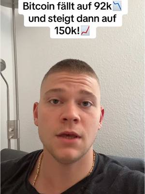 A man with short hair is centered in the frame, looking directly at the camera. Above him is a text overlay with information on Bitcoin’s price. The background is a plain, light-colored wall.