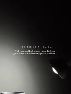 A minimalist, artistic image with a stark black background and a spotlight effect illuminating text. The text includes the biblical reference Jeremiah 33:3 and its corresponding verse, along with text that seems like it was added by the creator.