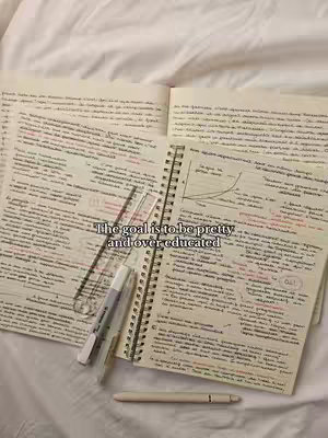 The cover image showcases an open notebook on a bed, filled with handwritten notes and highlighted text. A ruler, a pen, and a marker are placed on the notebook. The overall aesthetic is soft, with a warm color palette of beige and white.