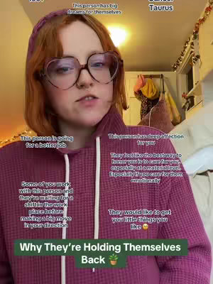 A woman with red hair, heart-shaped rimmed glasses, and a purple hoodie looks directly at the camera. Text overlays are visible around her conveying astrological insights with a green text hook at the bottom.