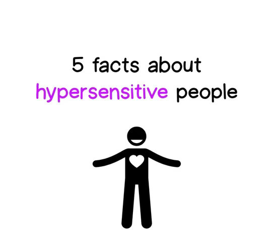 The image is a simple, minimalist graphic on a white background. At the top, there is text that reads "5 facts about hypersensitive people" in a large, bold font. The word "hypersensitive" is in a vibrant purple color, while the other words are black. Below the text is a graphic of a stick figure with a heart in place of their chest. The stick figure has their arms outstretched, as if embracing or welcoming something.
