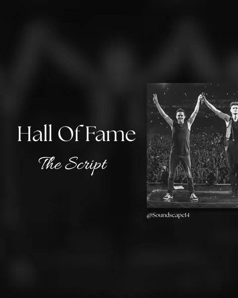 A black and white cover image featuring the words 'Hall Of Fame' and 'The Script'. It also shows two men on stage holding microphones in a concert setting. The background is blurred representing the audience.