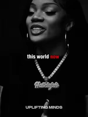 A grayscale image features a woman with dark hair and visible earrings. She has a necklace with a pendant that says 'Hallelujah'. The text overlay states 'this world now' in white with the word 'now' in red, and 'UPLIFTING MINDS' in white.