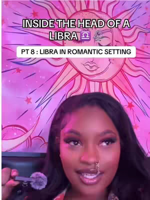 The cover image features a woman with dark hair and a nose ring, holding a microphone. She is positioned in front of a pink tapestry with a sun and star design. The text overlay indicates the video is about the Libra zodiac sign in a romantic setting.
