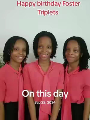 The cover image features three young women, likely triplets, smiling in a vertical shot. The women are positioned side by side, centered in the frame. They are all wearing matching red long-sleeved blouses with a slight neck tie. The background is plain, likely a white wall, which places clear emphasis on the subjects. Above the trios, the text reads "Happy birthday Foster Triplet" in a dark red font. At the bottom, "On this day" and "Sep 22, 2024." adds a special occasion element to the photo.