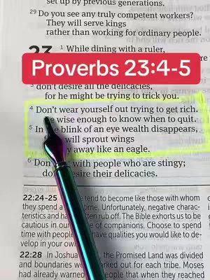 A close-up of an open Bible with text highlighted in yellow. A pen with a decorative cap rests in the foreground, partially obscuring the words. A red banner with white text is superimposed on the image.