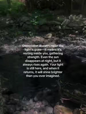 The image shows a dark, natural scene with flowing water and rocks in the foreground, and lush green foliage in the background. Text is overlaid on the image, providing a message about hope and resilience.