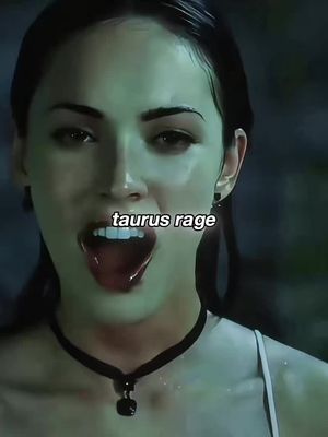 The cover image features a close-up of a woman's face, her mouth wide open with her tongue extended. Above the mouth, the text "taurus rage" is displayed. The background is a blurred, green-tinted environment, which adds to the dramatic effect, and may suggest water.