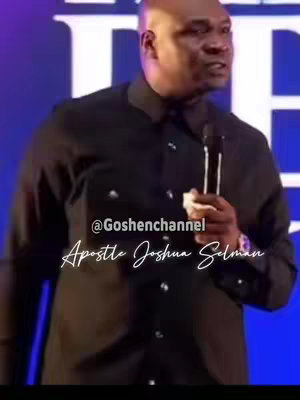 A man wearing a black shirt is holding a microphone on a stage. At the bottom of the image, overlaid in white script, are the words '\@Goshenchannel' and 'Apostle Joshua Selman'.