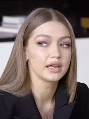 The cover image shows a close up of a female face with long blonde hair. The person is looking off to the side and is wearing light makeup. The words "april TAURUSSS" are overlaid on the image in white.
