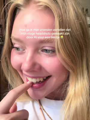 A close-up shot of a fair-skinned, young woman with blonde hair. She is smiling and looking to the left. Her finger is up to her lips, and the text overlay is in the upper center.