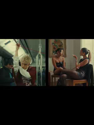 The cover image shows a split screen. On the left, a person with blonde hair in a red and white sweatshirt holds onto a pole in a bus. On the right, two women are in a room, one is seated with her hands in a talking position, the other has her legs crossed, and is holding a hand up.