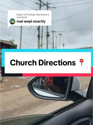 The cover image is a vertical shot taken through the front-side window of a car. The right-side mirror is in focus, showing an in-car reflection of a person holding a phone and a building in the background. Above, a comment reads "ruai wapi exactly" with an avatar. A cyan and white banner overlay with the text "Church Directions" and a pin marker. The background shows utility poles, power lines, and a cloudy sky.