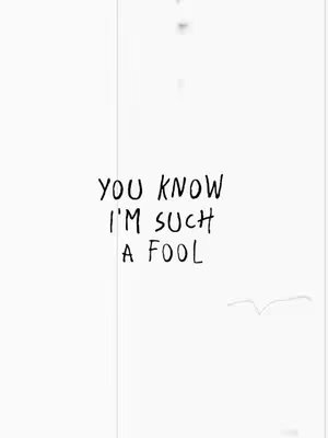A minimalist image featuring a plain white background. Centered, in a handwritten font, are the lyrics: "YOU KNOW I'M SUCH A FOOL". There is a vertical seam on the left and a small tear-like shape on the right of the text.