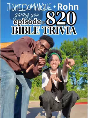 A cover image features two people of color, one male on the left and a female on the right, posing. The male, wearing a brown jacket and glasses, is slightly crouched with his left leg forward and right leg back, is pointing forwards with his right index finger. The female, wearing a white top, dark vest, and round glasses, is squatting with one leg folded and pointing with her right index finger as well. The image has a bright blue sky backdrop and green foliage/grass at the bottom, with text overlays.