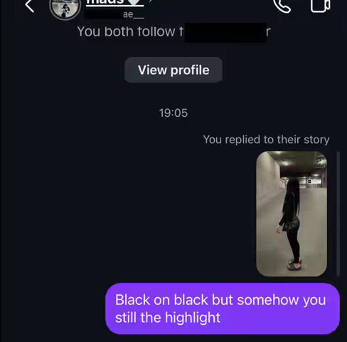 The image captures a screenshot of a mobile messaging interface with a dark theme. It prominently displays a conversation thread with the user's profile and message bubble containing the caption. A preview of a story post from the user is shown on the right, featuring a person in black attire in an indoor environment. Additional details include time stamps and interface elements.