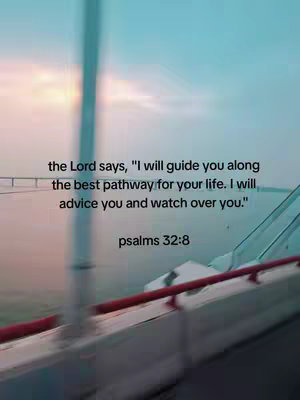 The image captures a view from a vehicle, possibly a train or car, with a blurred foreground of the interior details. The background shows a bridge or overpass against a colorful sky with shades of pink, orange, and blue. Text overlayed provides a scripture reference.