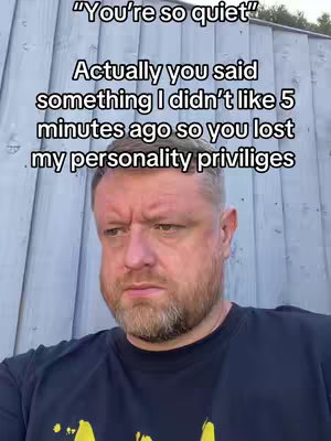 A close-up shot features a man with a beard and a slightly concerned expression. Text overlayed on the image lists a quote above and a longer explanatory phrase explaining the man's expression.