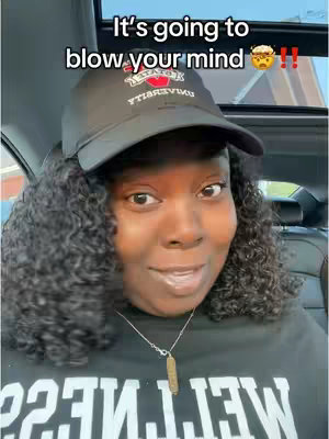 The cover image shows a close-up of a woman sitting in a car, with a black baseball cap and curly hair framing her face. Text overlays read 'It's going to blow your mind' in white font. The background and window of the car are visible.