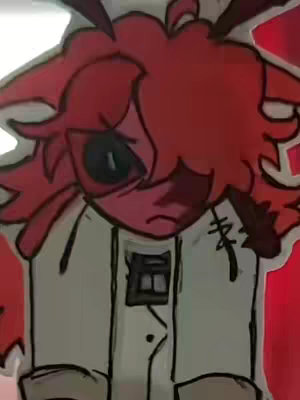 A close-up image featuring an illustrated red character with large head and expressive face, set against a blurred, red-toned background. The character has red skin and hair, with a white coat and a dark eye with a patch covering the other eye. The image is a stylized, digital illustration or possibly a crafted paper doll figure.