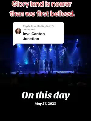 The image shows a stage with performers in silhouette, illuminated by blue lights. Text overlays at the top read 'Glory land is nearer than we first belived' and the bottom has 'On this day May 27, 2023', with a comment section in the middle.