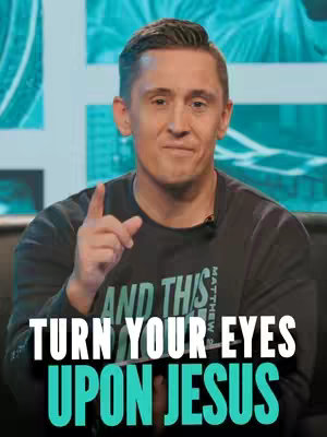 A man with short brown hair is the central figure, viewed from the chest up and pointing his right index finger upward. He wears a dark gray long-sleeved shirt. Heavy, superimposed white text reads, 'TURN YOUR EYES UPON JESUS' across the bottom.