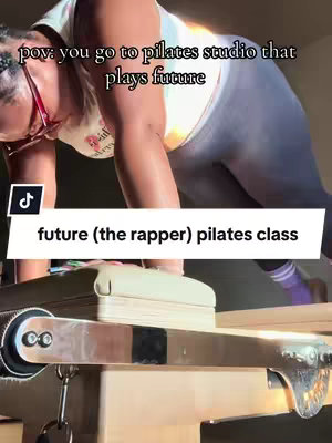 A woman in activewear performs a pilates exercise on a reformer machine. She is angled downwards and the machine dominates the lower foreground. Text overlays detail "future(the rapper) pilates class". The overall composition is active and inviting.