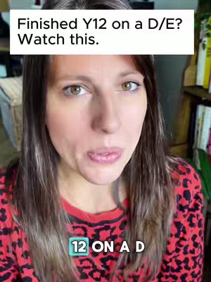 A woman is centered in a selfie-style video. She has long, brown hair and a red and black patterned top. Over her shoulders is a white text box containing the message "Finished Y12 on a D/E? Watch this.". Below her, in a light blue background, is the text "12 ON A D".