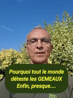 The image shows a mature man in glasses posed with a background of lush green foliage and a bright blue sky. Overlayed on the image is a dark green rectangular box with white and yellow text.