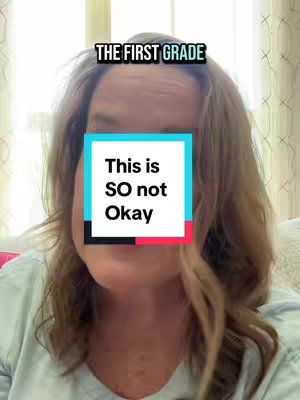 A woman's face, centered and filling the frame. She has brown hair, and her skin tone is fair. Overlaid on her lower face is a colorful box containing text. The background suggests an indoor setting, with curtains visible.