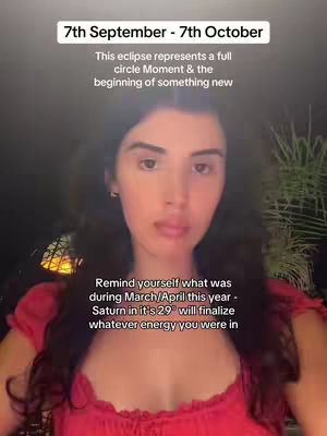 A woman with long dark hair is in the center of the image, looking towards the camera. She's wearing a red top. The top of the image has text overlayed within a black box reading "7th September - 7th October." Below this, a few more lines of text detail what the eclipse represents, and the end of the text notes advice for the viewer about things that happened in March/April.